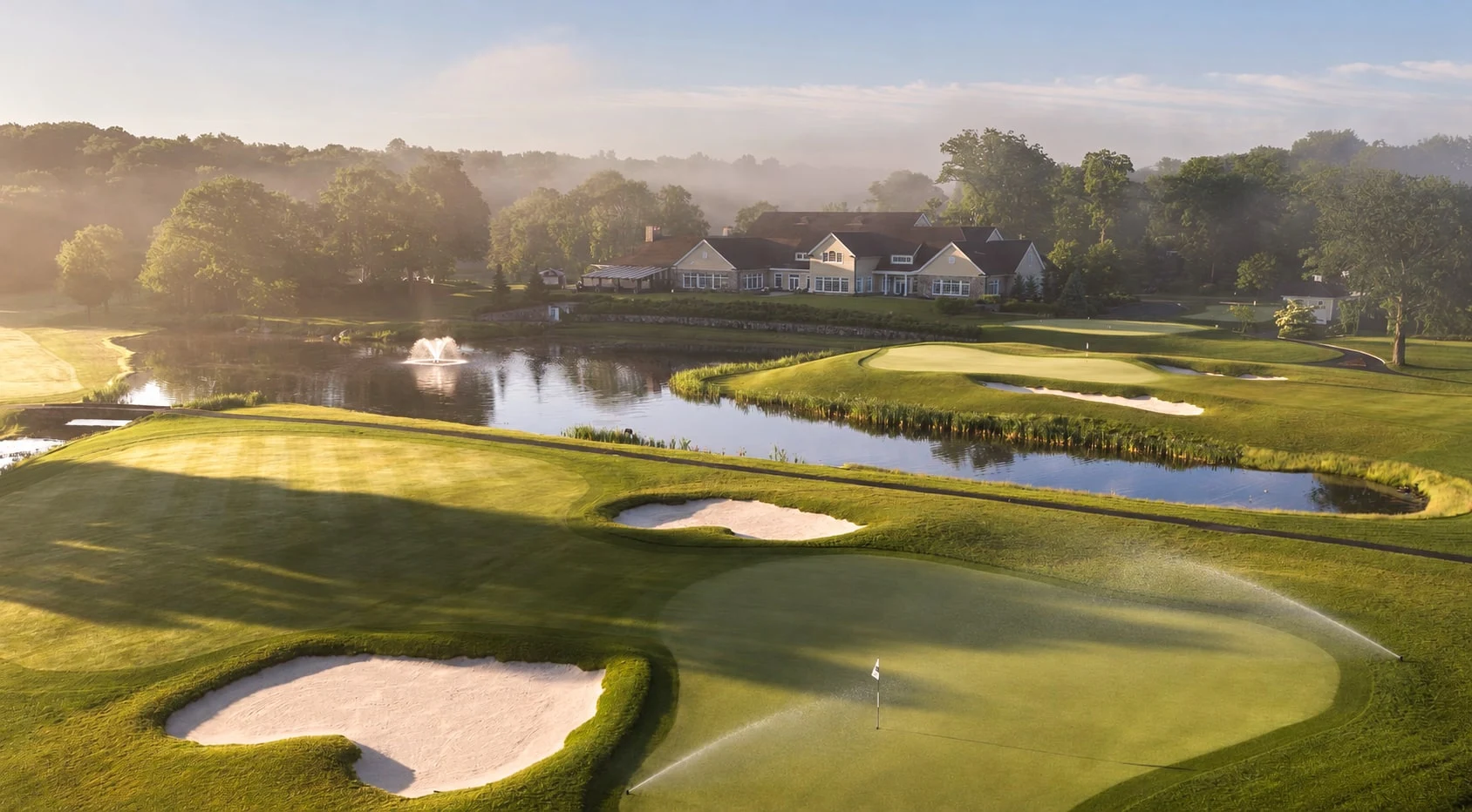 The clubhouse and course at Burning Tree Country Club, with illustrative irrigation added.