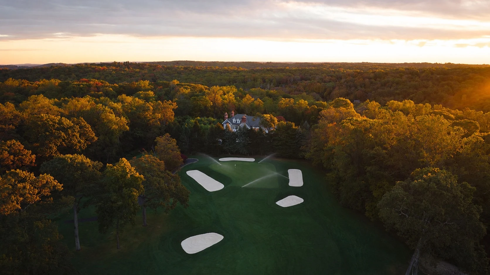 Evening above the green at Whippoorwill Club, with illustrative irrigation added.