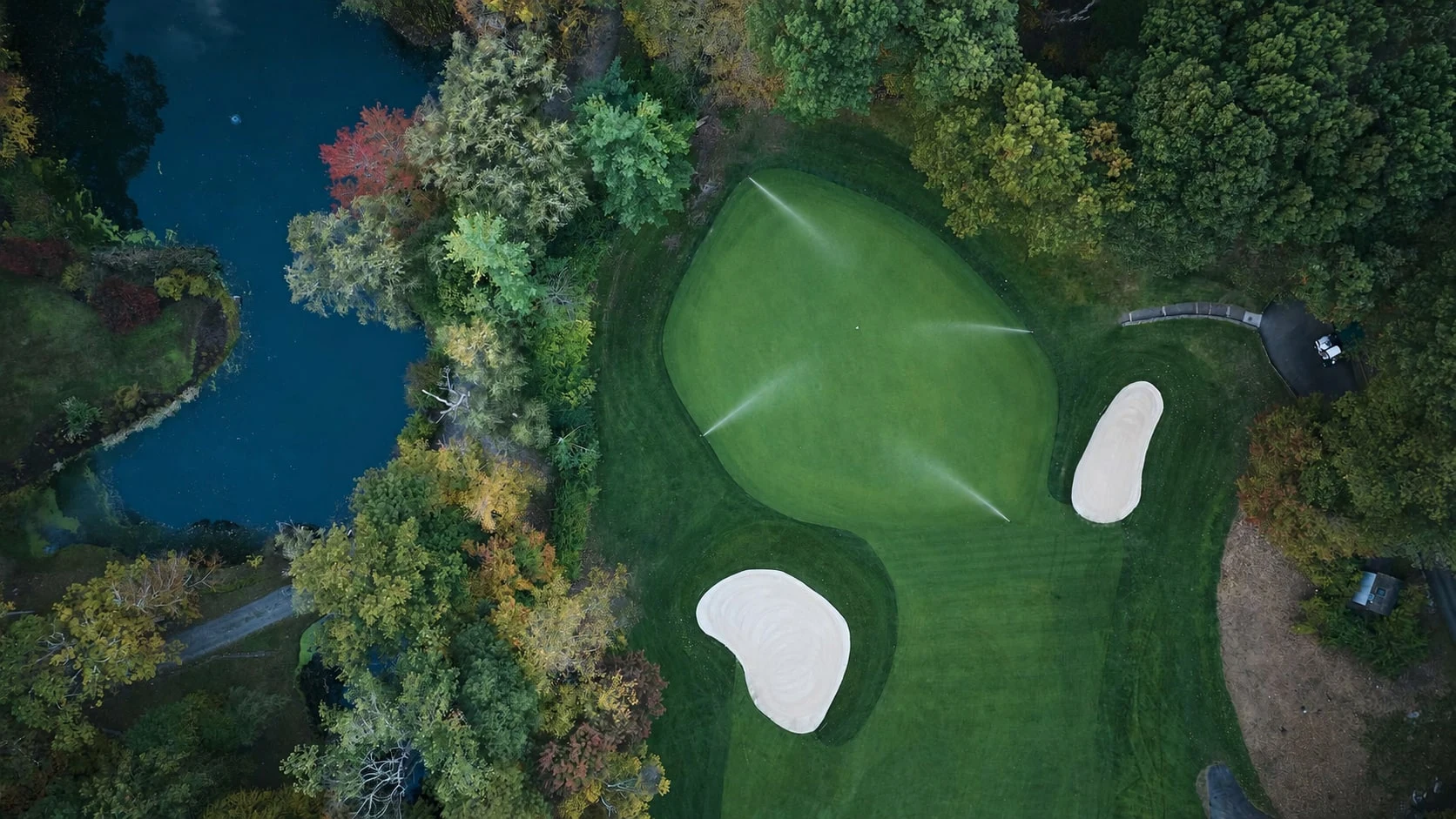 An overhead view beside the pond at Whippoorwill Club, with illustrative irrigation added.
