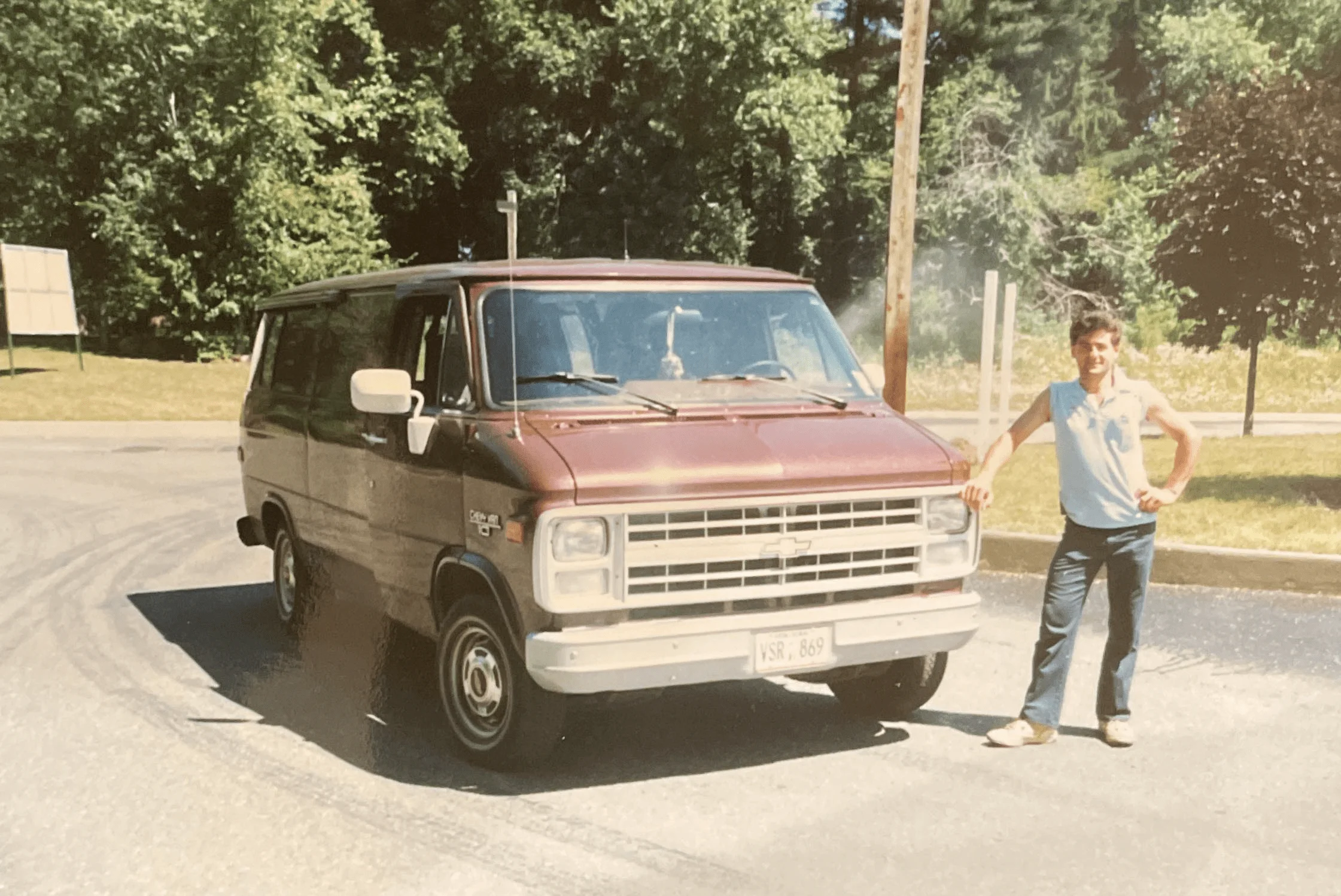 John Luciano beside the company’s first van.